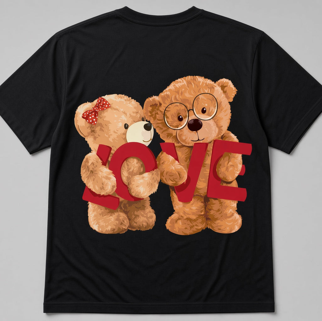 A black short-sleeve t-shirt with a graphic print of two teddy bears hugging and holding the word 'LOVE' in red letters, shown against a neutral gray background.