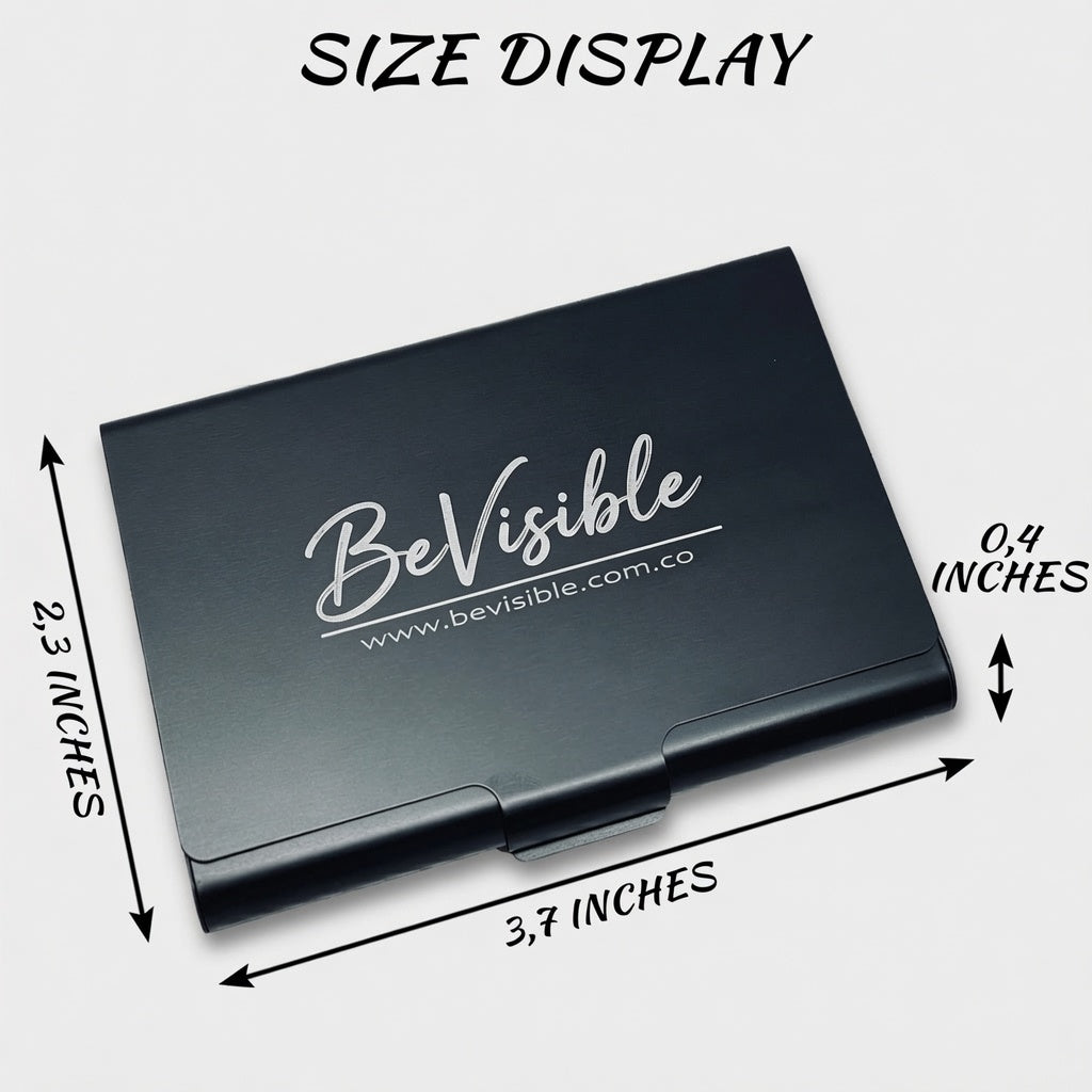 A black metal business card case shown on a light gray background with overlaid dimension arrows and text reading 'SIZE DISPLAY,' '2.3 INCHES,' '3.